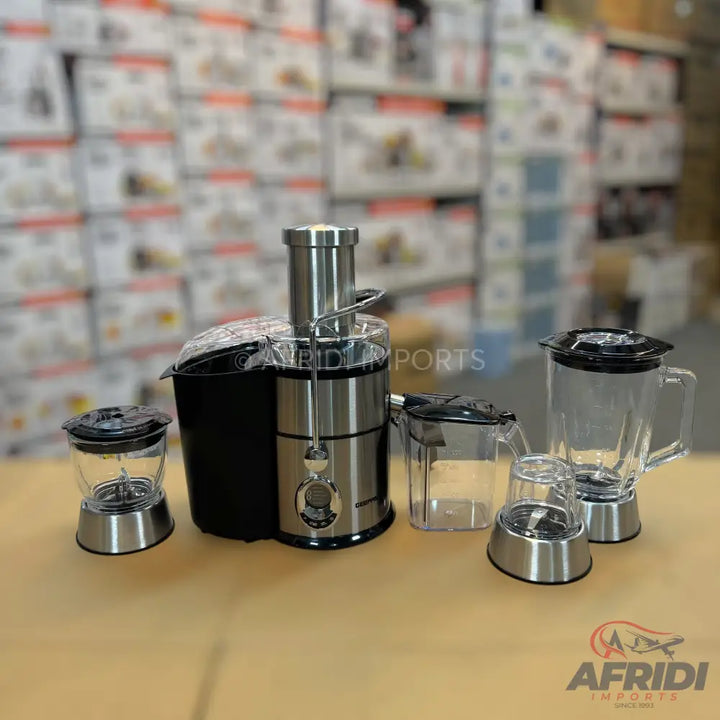 Stainless steel multi-function juicer, blender, and grinder set.
