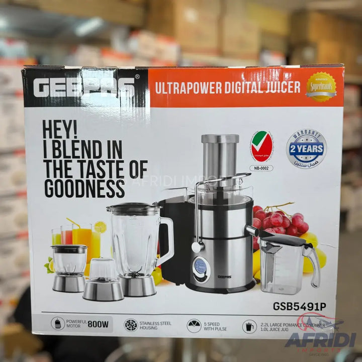 A ’Geepas Ultrapower Digital Juicer’ with a blender and other attachments, featuring an 800W powerful motor, stainless steel housing, 5 speeds with pulse, and a 2-year warranty.