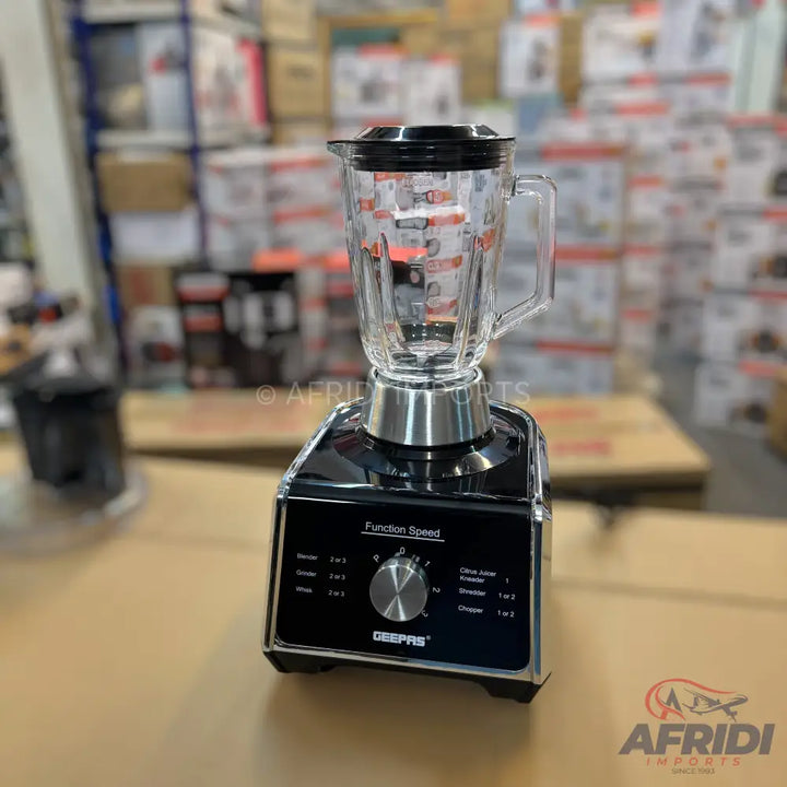 Black and silver blender with a clear glass jar.