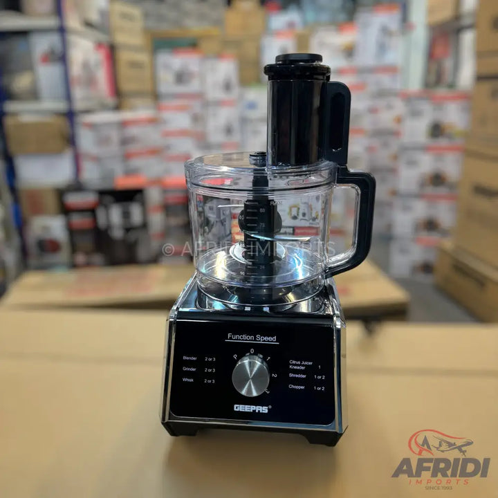 Black and clear food processor with multiple speed settings.