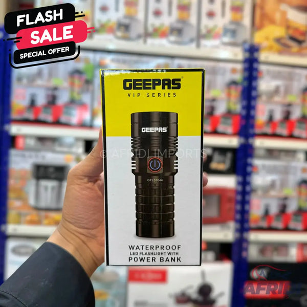 A black waterproof LED flashlight with a power bank.