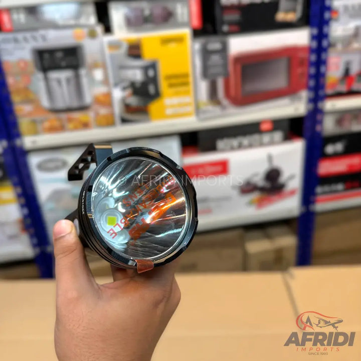 Hand-held flashlight with multiple LED bulbs.