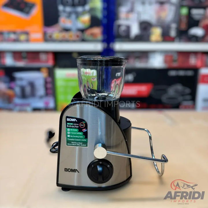 Stainless steel and black fruit juicer with a clear pulp container.