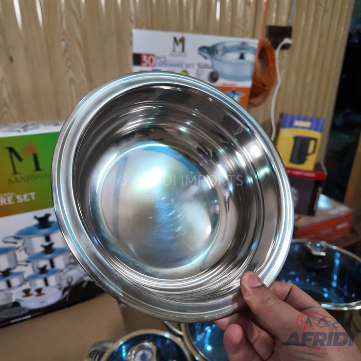 Stainless steel cooking pot with a polished finish.