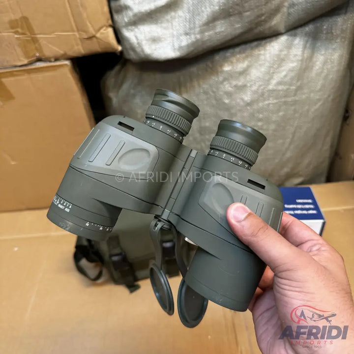 Olive green, waterproof binoculars with rangefinding reticle.