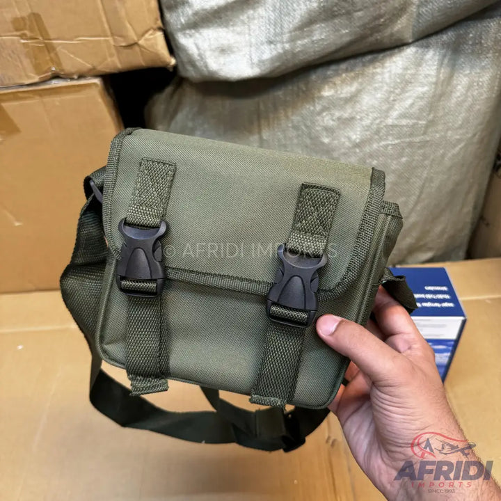 Olive green canvas messenger bag with black plastic buckles and adjustable strap.
