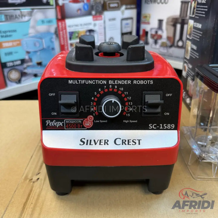 Red and black multifunction blender base with a speed dial.