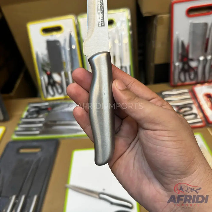 A stainless steel paring knife with a full-tang design.