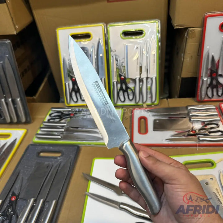 Stainless steel chef’s knife with a full tang and a metal handle.