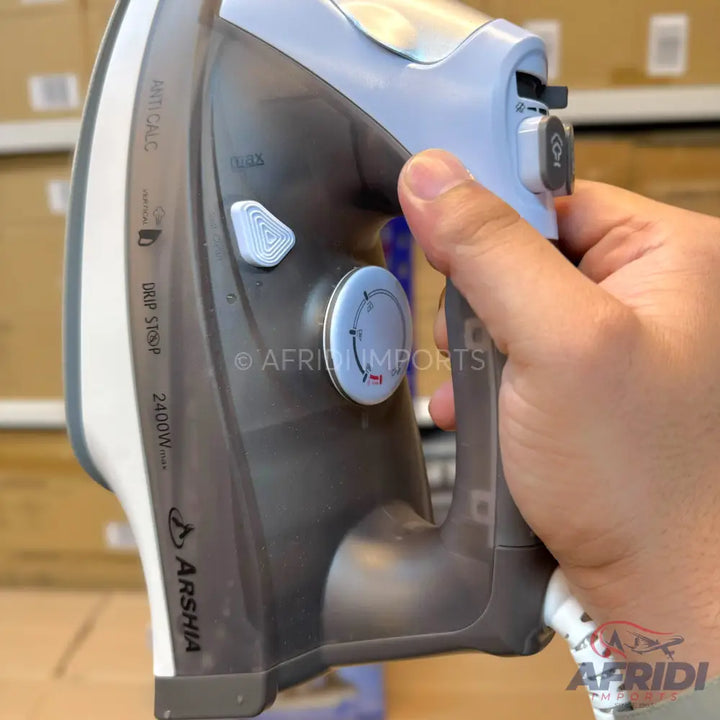 A steam iron with a grey body, white soleplate, and light blue accents.