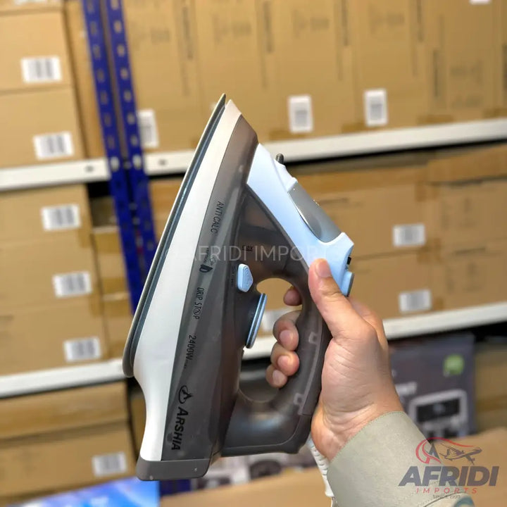 A light blue and dark grey steam iron with a textured handle.