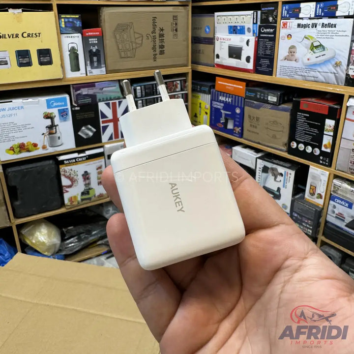 White rectangular power adapter with two prongs.