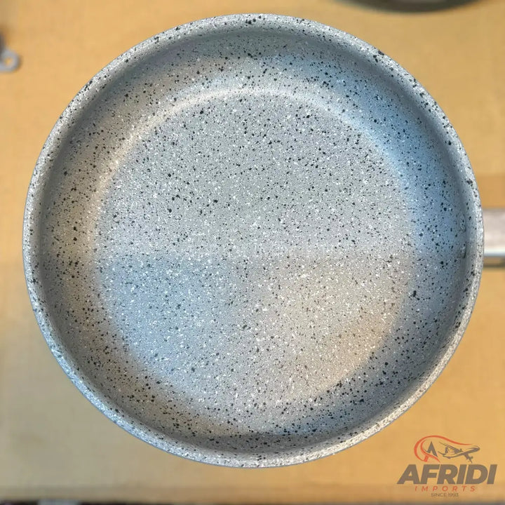 Gray speckled non-stick frying pan.