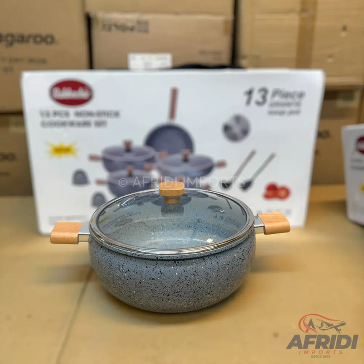 Gray speckled non-stick cookware set with wooden handles and glass lids.
