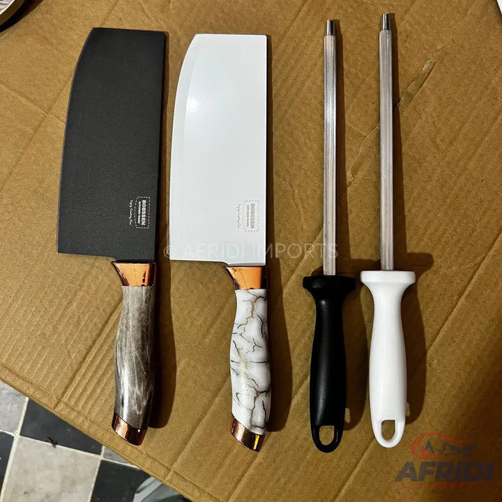 A set of two cleavers and two sharpening steels.
