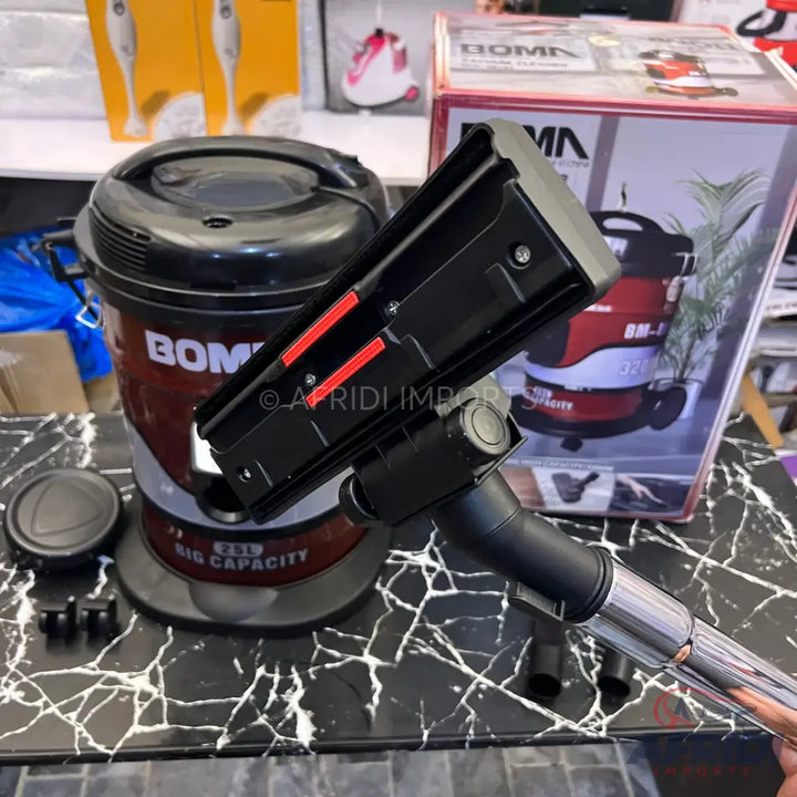 Red and black wet and dry vacuum cleaner with a 25L capacity.