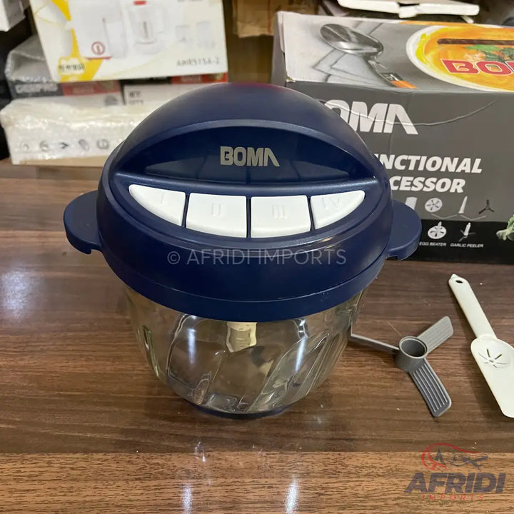 A dark blue, domed food chopper with a clear glass bowl, featuring four white push buttons on top and a three-bladed attachment beside it.