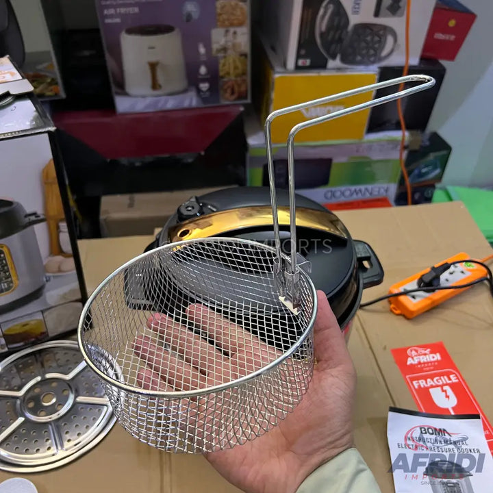 A stainless steel wire mesh frying basket with a foldable handle.