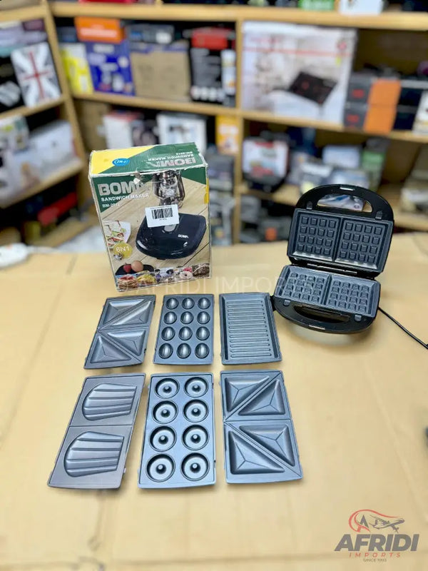 A multi-functional waffle maker with six interchangeable cooking plates for various snacks.