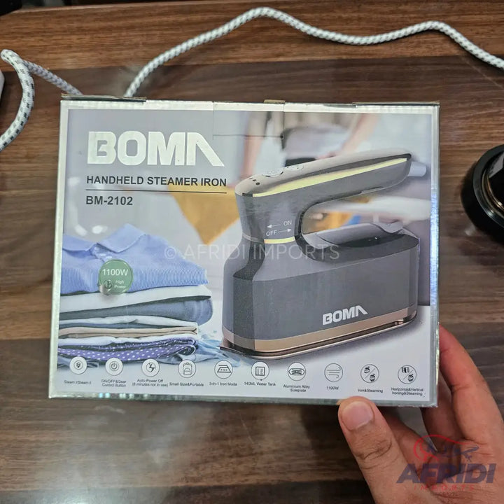 Packaged handheld steamer iron with a ’FLASH SALE SPECIAL OFFER’ tag.