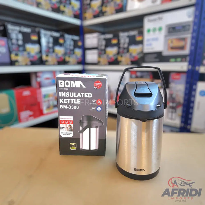 Stainless steel insulated hot water kettle with a pump dispenser and carrying handle.