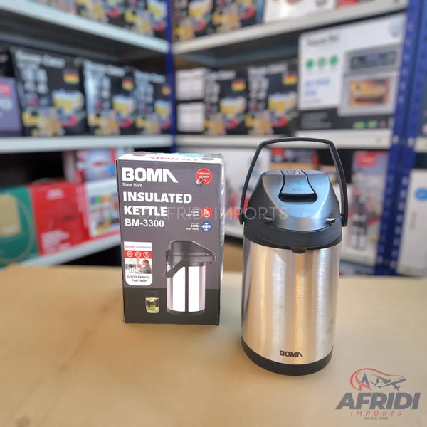 Stainless steel insulated hot water kettle with a pump dispenser and carrying handle.