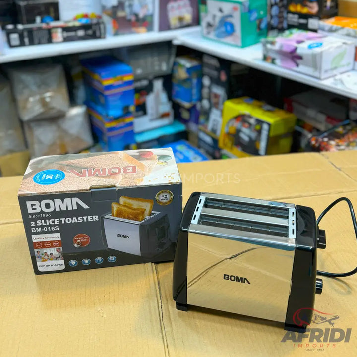 A stainless steel and black two-slice toaster with its packaging.