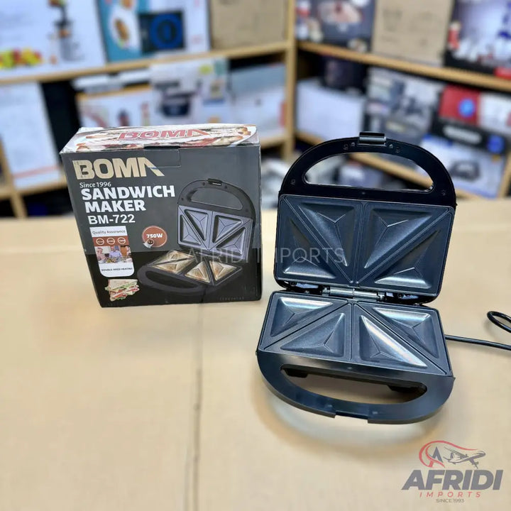 Black Boma BM-722 sandwich maker with non-stick triangular plates.