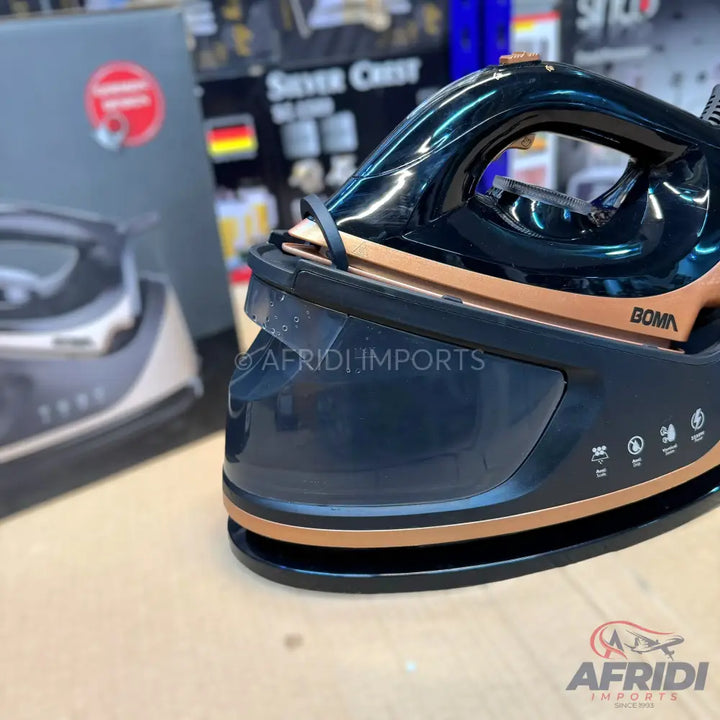 Black and copper steam iron with a water tank.