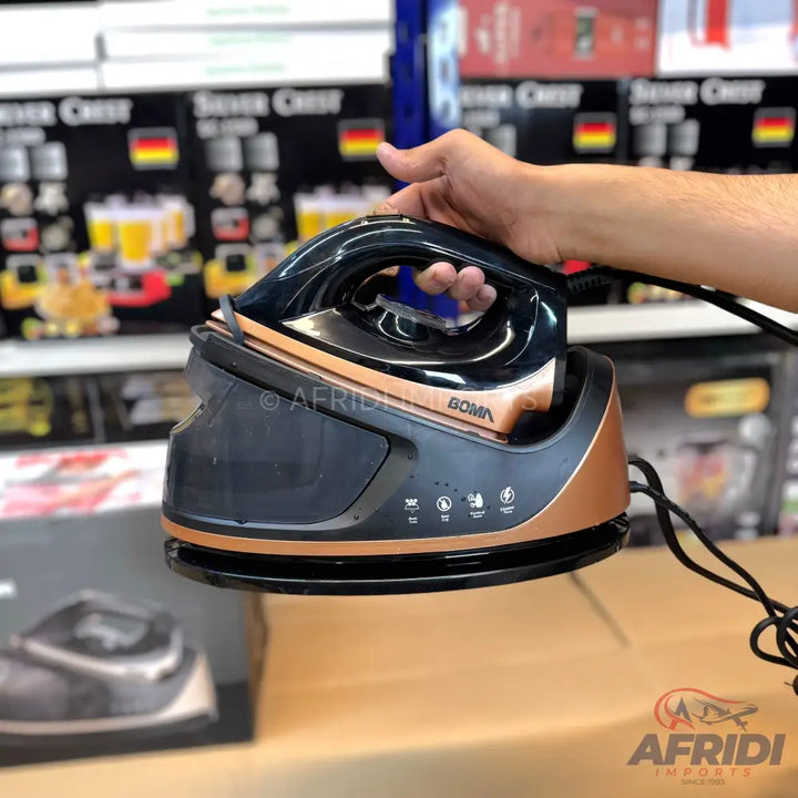 Black and copper steam iron with a separate water tank.