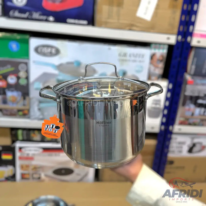 Stainless steel stockpot with a glass lid.