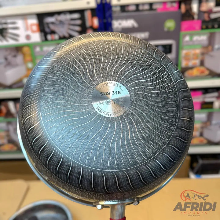 The textured, non-stick underside of a frying pan.