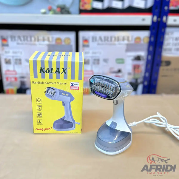 A white and grey handheld garment steamer with a clear water tank, accompanied by its yellow and blue striped box.