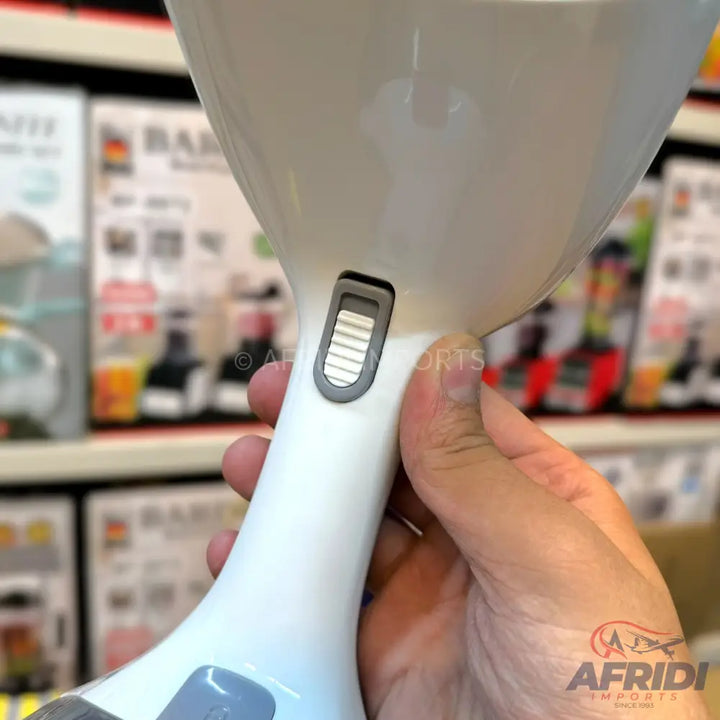White handheld blender with a textured gray speed control slider.