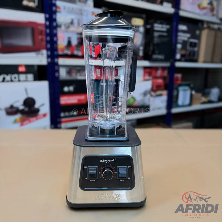 Stainless steel kitchen blender with a clear pitcher, variable speed dial, and pulse function.