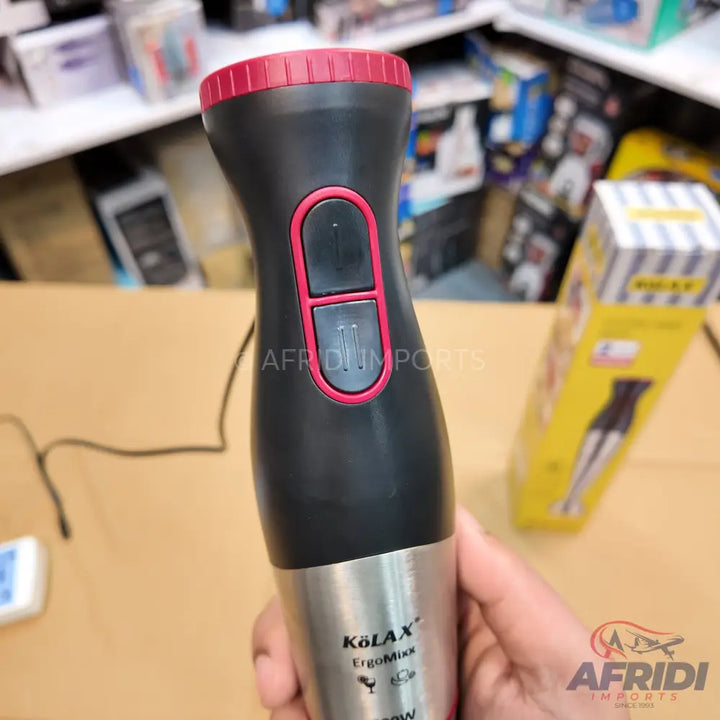 Black and silver immersion blender with red accents.