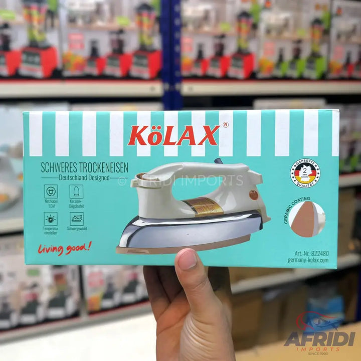 A boxed electric dry iron with ceramic coating, designed in Germany.