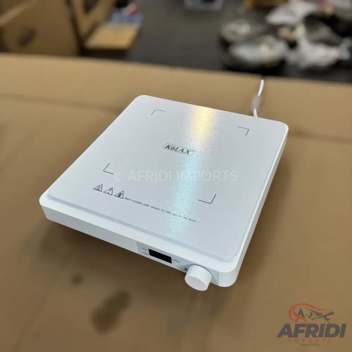White portable induction cooktop with a single burner.