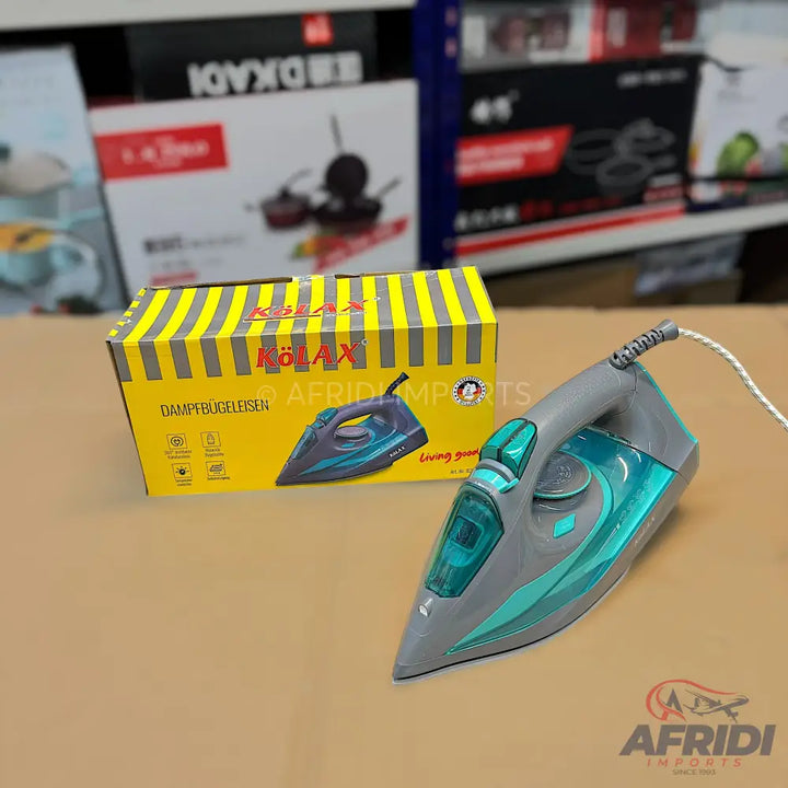 Gray and teal steam iron with a matching box.