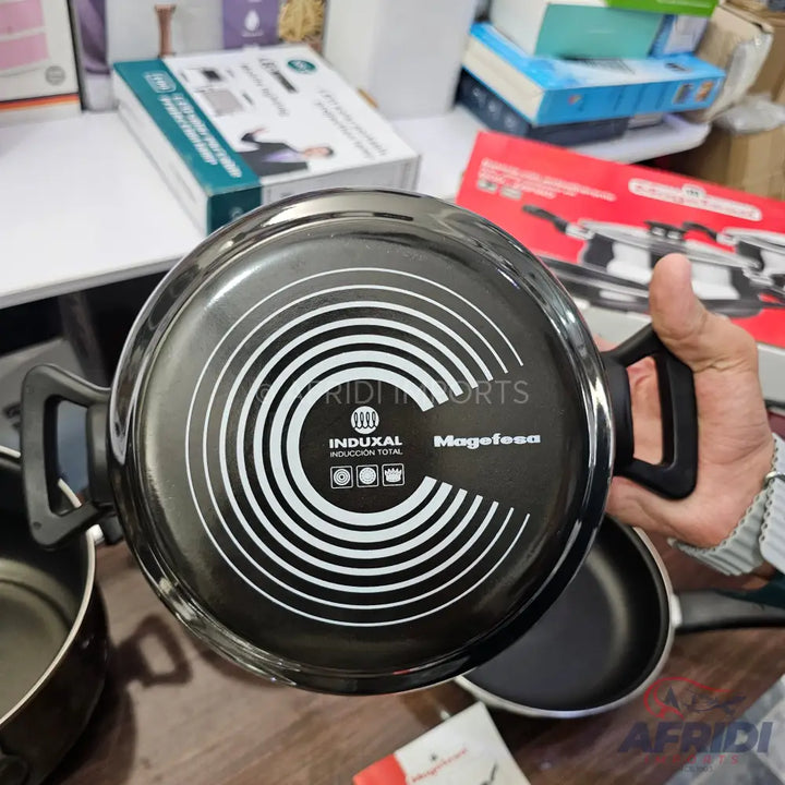 Black non-stick induction-compatible frying pan.