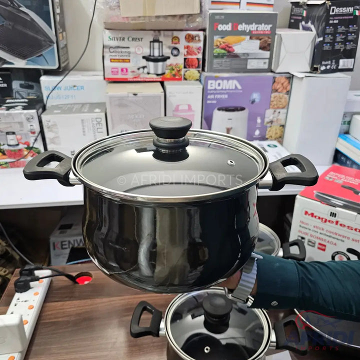 Black cooking pot with a glass lid and two side handles.