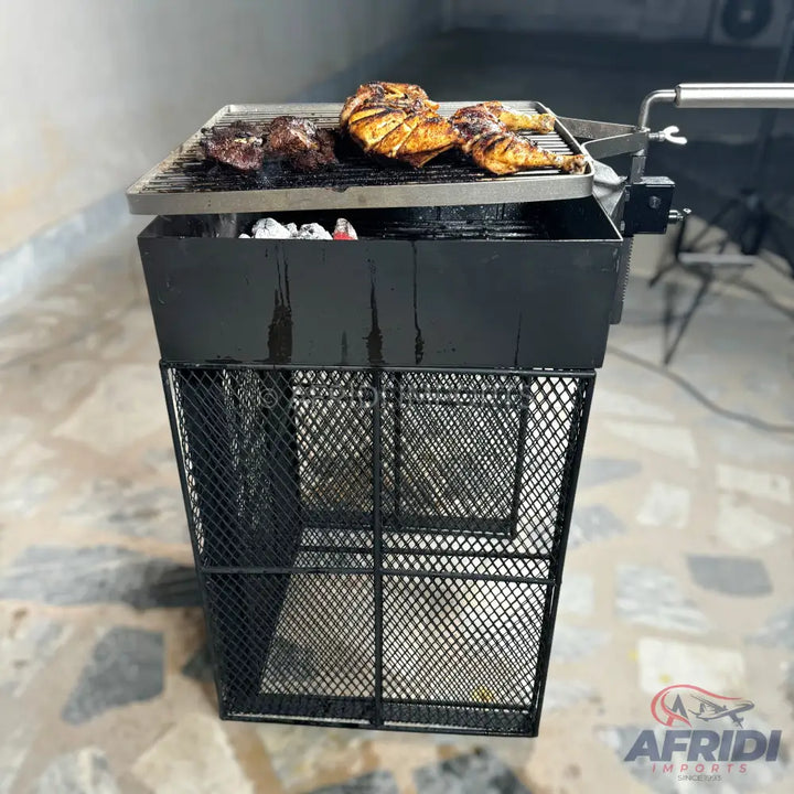Black, metal charcoal grill with a rotating spit for cooking meat.