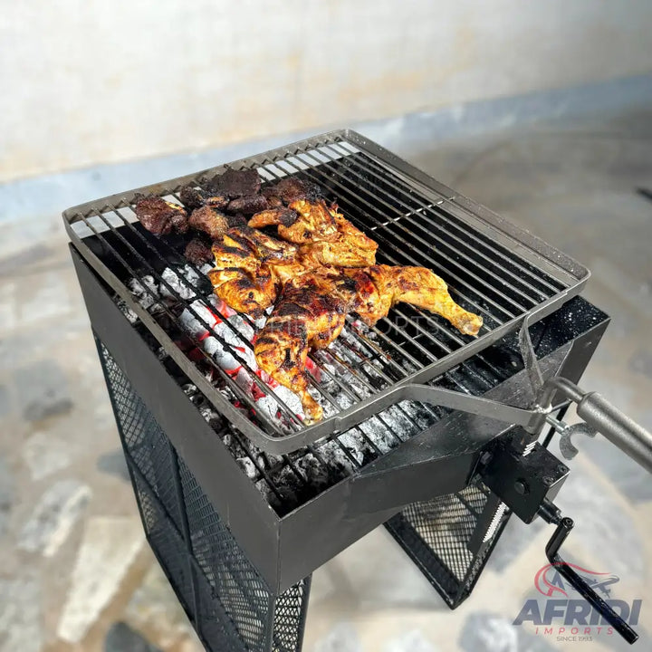 Charcoal grill with a rotating spit and a top grilling grate, cooking chicken and other meats.