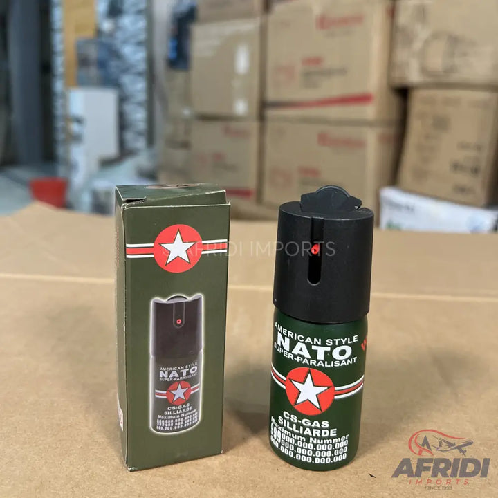 Green and black pepper spray canister.