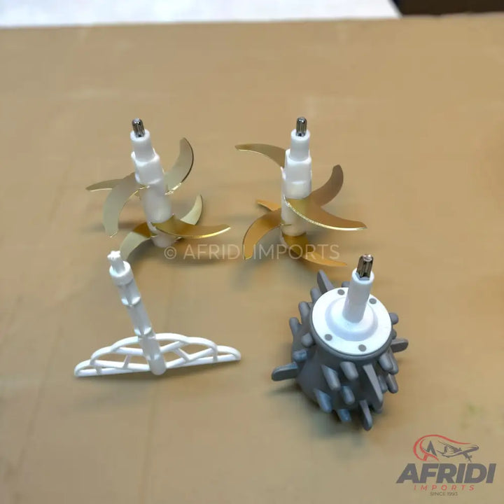 A set of food processor blades and attachments.