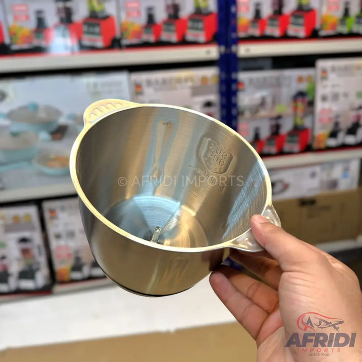Stainless steel blender cup with an internal blade.