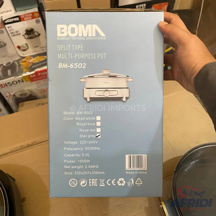 Boxed electric multi-purpose cooking pot.