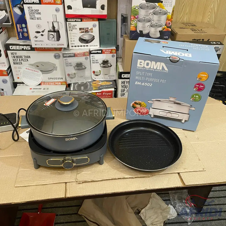 A Boma split-type multi-purpose pot with a separate grill pan.