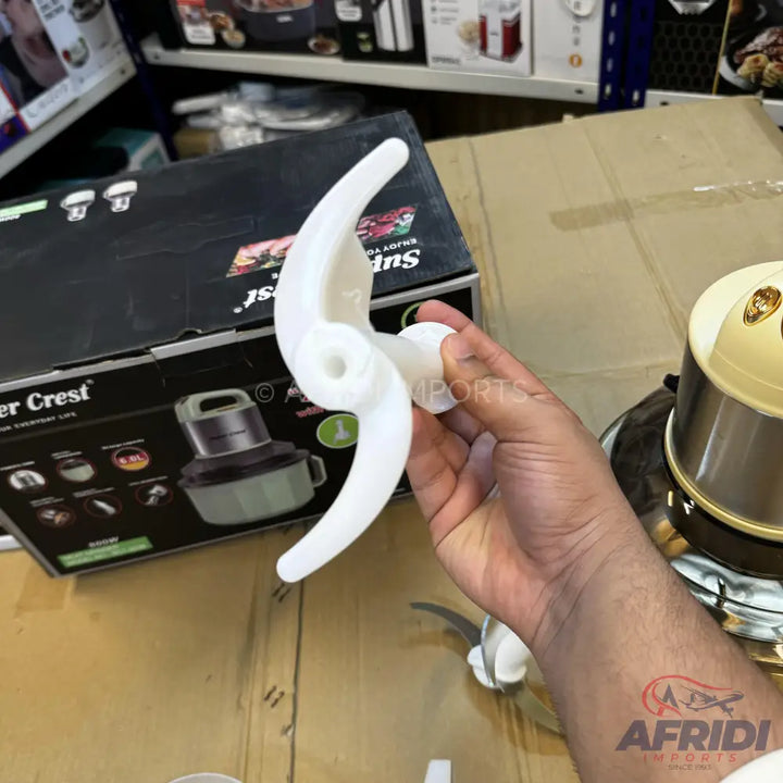 White plastic mixer blade with two curved arms.