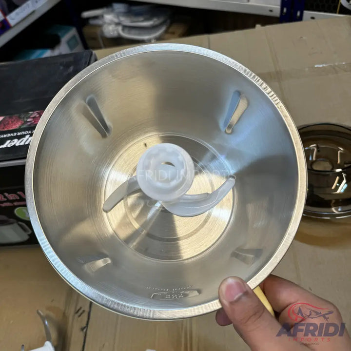 Stainless steel food processor bowl with a two-bladed agitator.